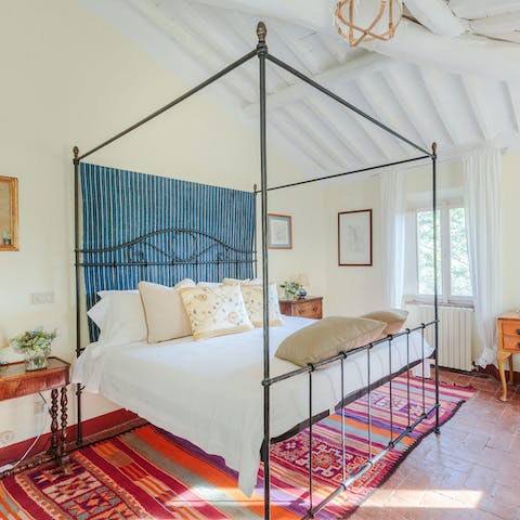 Look forward to waking up in the comfortable four-poster bed