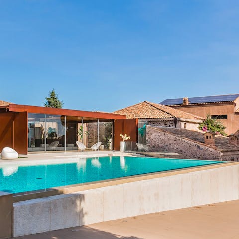 Relax on the glass-walled veranda