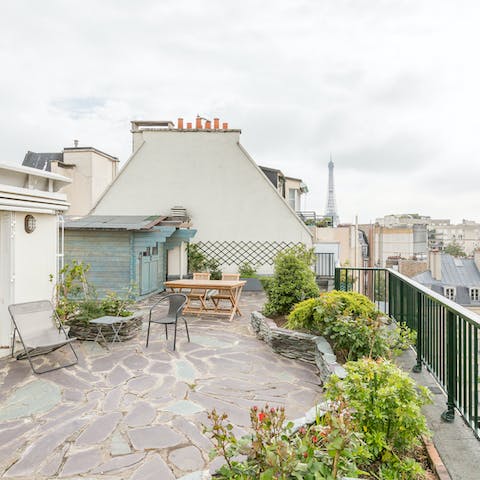 Enjoy a view of the Eiffel Tower and Paris from your own rooftop terrace