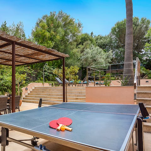 Get competitive over a game of ping pong in the garden 