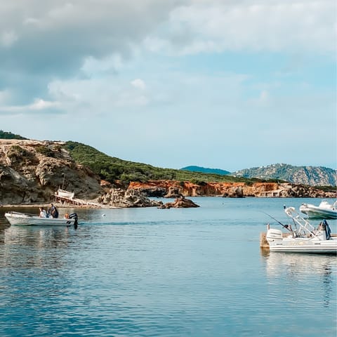 Stroll to Cala Vedella's picturesque cove in just twenty minutes
