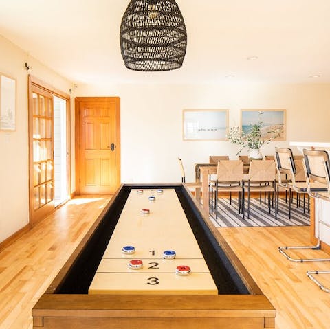 Host a game night with shuffleboard in the breakfast room