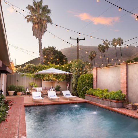 Take a dip in the private pool, with the ocean waves in the distance