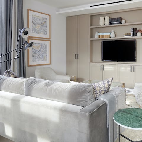 Stay in for a cosy film night in the snug living area