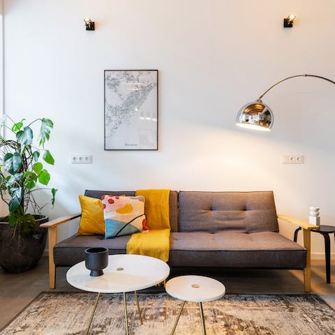 Kick back in the stylish living room after a day of exploring the city