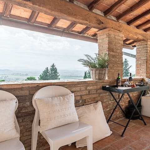 Admire mesmerising views of the Tuscan hills from the turret