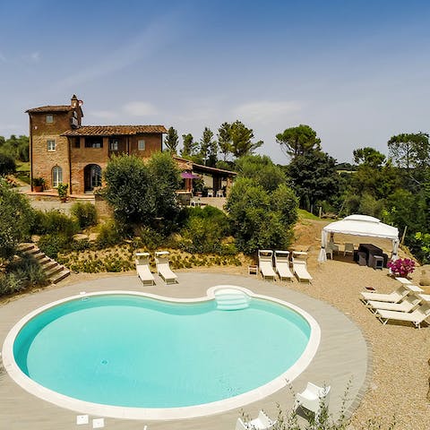 Swim in your private pool, hidden from view by olive groves