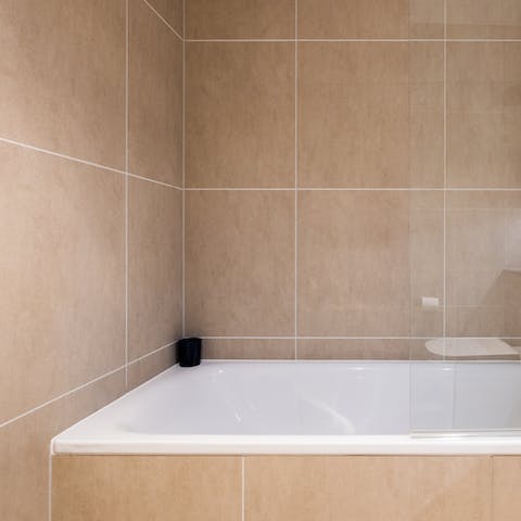 Soak in one of the two bathtubs