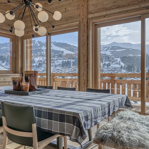 Soak up panoramic views of the snow capped mountains as you dine