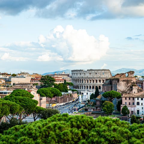 Explore Piazza Venezia, a twelve-minute stroll from this home