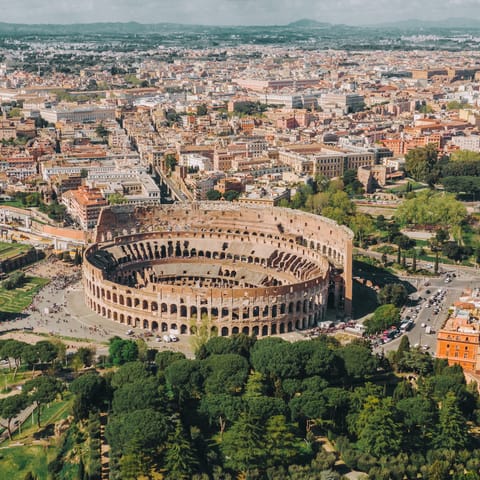 Visit the iconic Colosseum and Roman Forums, just a ten-minute walk away 