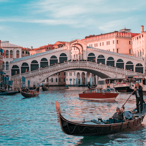 Take a stroll across Rialto Bridge, just over a five-minute walk away