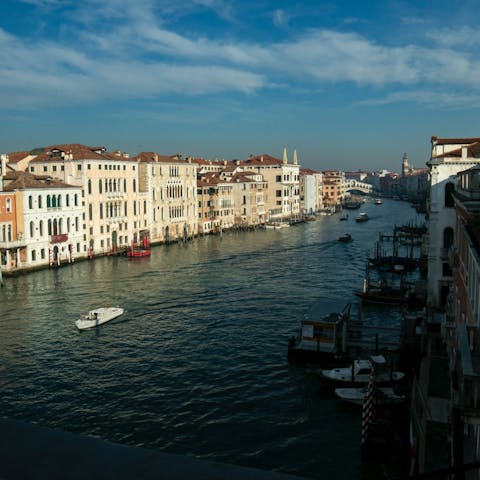 Take in the incredible views over the Grand Canal to the Rialto Bridge