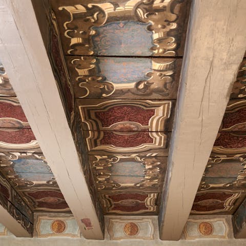 Admire the beautiful frescoes