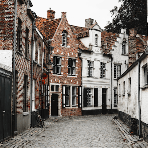 Plan a day trip to the fairytale city of Bruges, just thirty-five minutes away by car