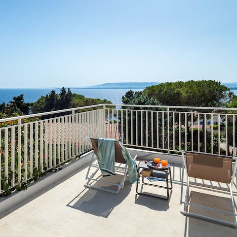 Head up to the first-floor balcony and gaze out over the gorgeous view