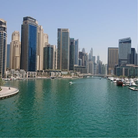 Wander the banks of Dubai Marina, less than twenty minutes away in the car