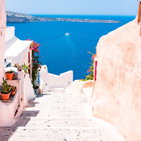 Enjoy the breathtaking views and whitewashed architecture of Oia 