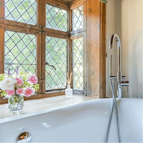 Enjoy a warm soak in the roll-top bath, as you overlook the Manor's gardens