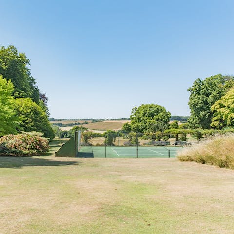 Play a game of tennis on the Manor’s shared tennis courts