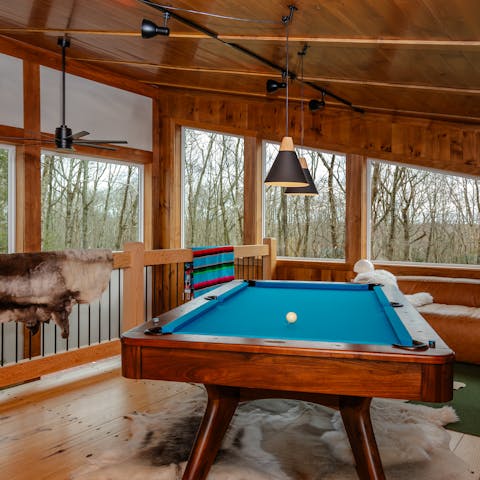 Try your hand at pool in the fun-filled loft