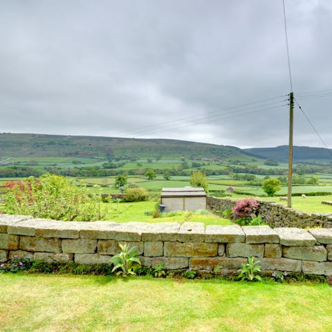 Gaze out over the rolling North York Moors from your walled garden