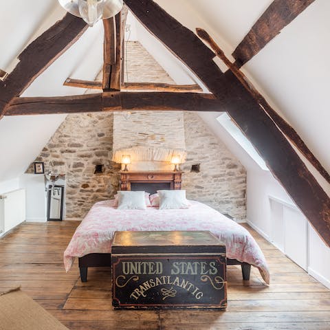 Wake up each morning beneath ancient wood beams in a 16th-century building