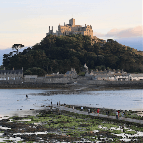 Visit the iconic St Michael's Mount, a forty-minute drive away