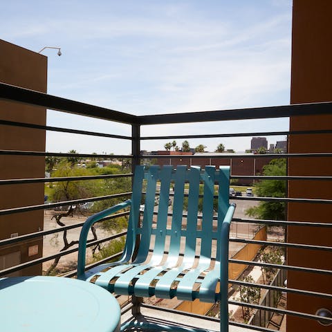 End the evening with a glass of wine on the private balcony, watching the desert sunset