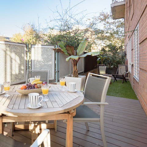 Step outside and savour this calm oasis by the sea