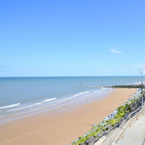 Sunbathe at the the pretty Sheringham Beach, just under a kilometre away