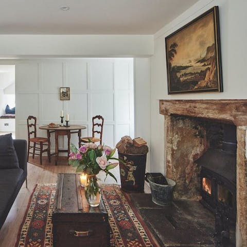 Curl up in front of the log fire in this cosy cottage