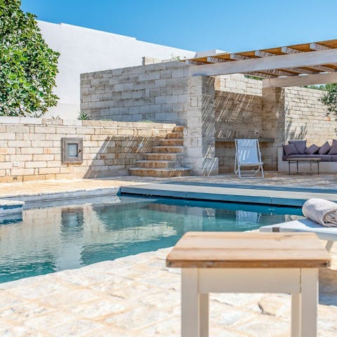 Spend relaxing days by the swimming pool or make the short drive to the beach