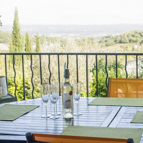 Admire the scenery on the terrace, the perfect spot to sip a glass of local rosé