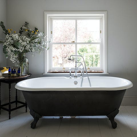 Treat yourself to half an hour away from the kids in the freestanding bathtub