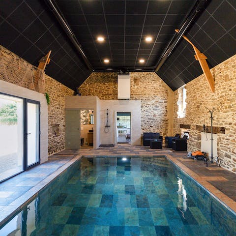 Take a dip in your very own indoor swimming pool, complete with shower