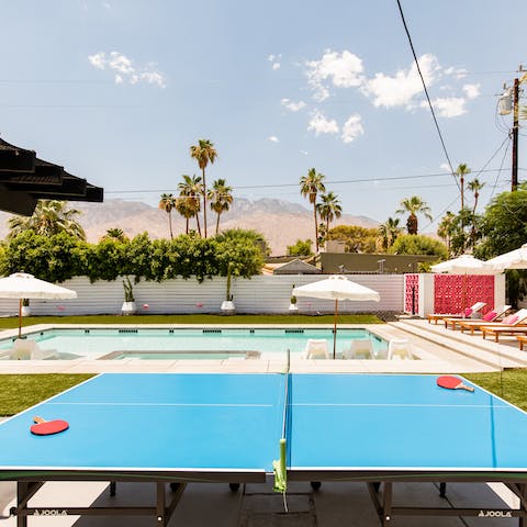 Get competitive over a round of ping pong in the California sunshine