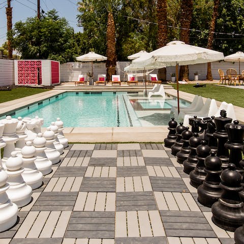 Enjoy a game of giant chess by the pool 