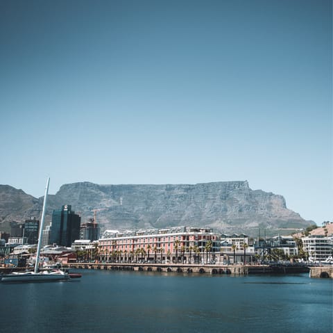 Explore the scenic V&A Waterfront with its incredible views of Table Mountain