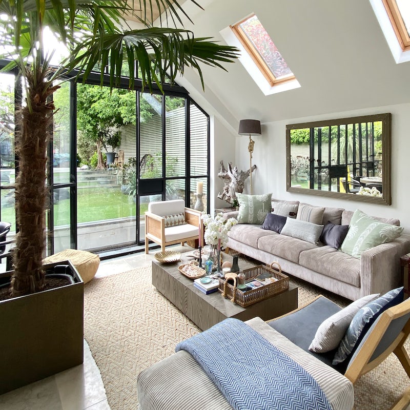 Stretch out on the sofa and keep an eye on the kids playing the garden
