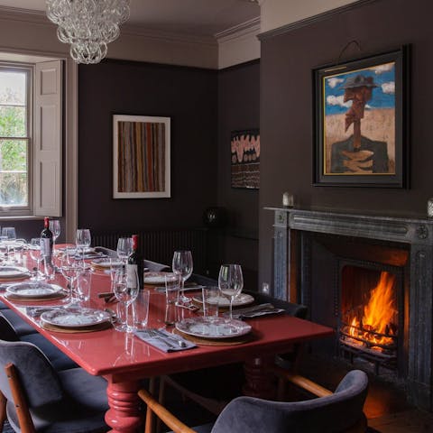 Gather for magical evening meals by the open fire