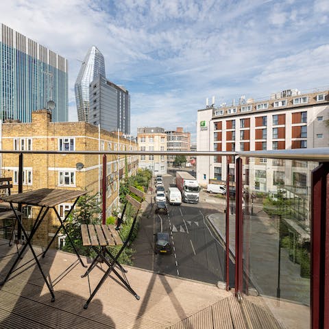 Take in the views over London from the private balcony