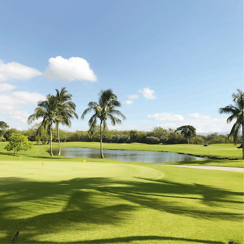 Tee off the 18-hole championship golf course designed by Tiger Woods, it's within your complex