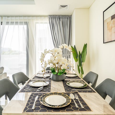 Share intimate dinners together around the elegant dining table