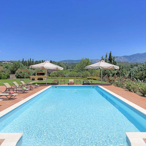 Cool off in the pool and take in the picturesque hillside views