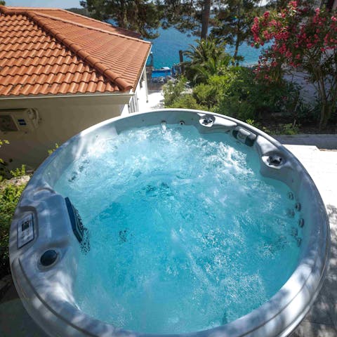 Luxuriate in the private whirlpool and admire sensational sea views