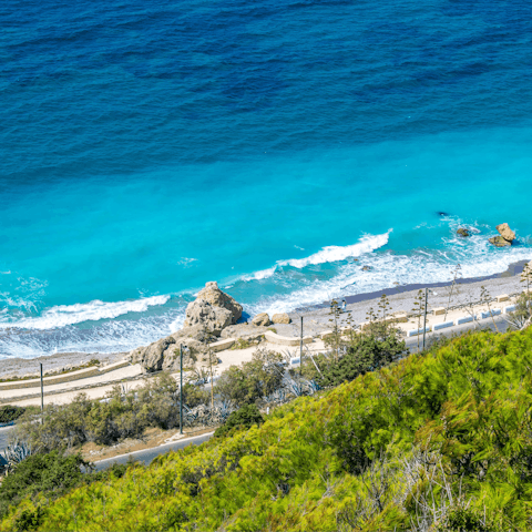 Drive to the beach to swim in the clear, calm sea