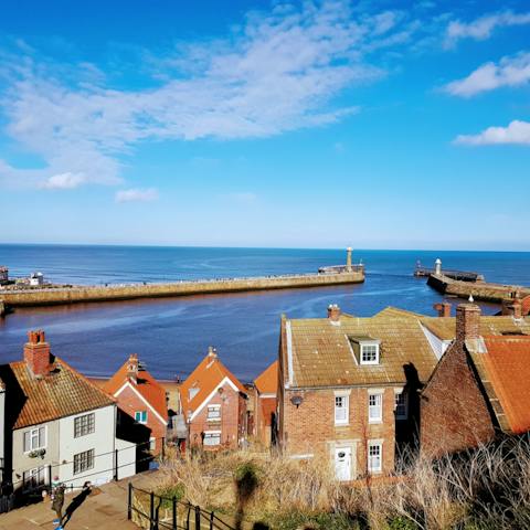 Spend sunny afternoons exploring the quaint coastal town of Whitby 