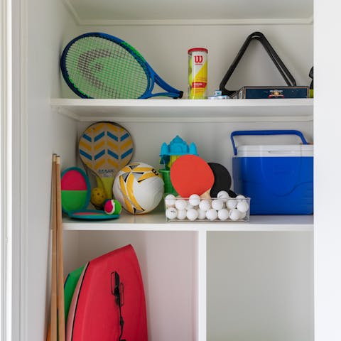 Dig through the closet with all the beach supplies