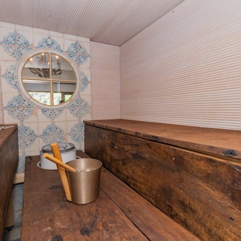 Inhale the relaxing steam in the antique sauna 